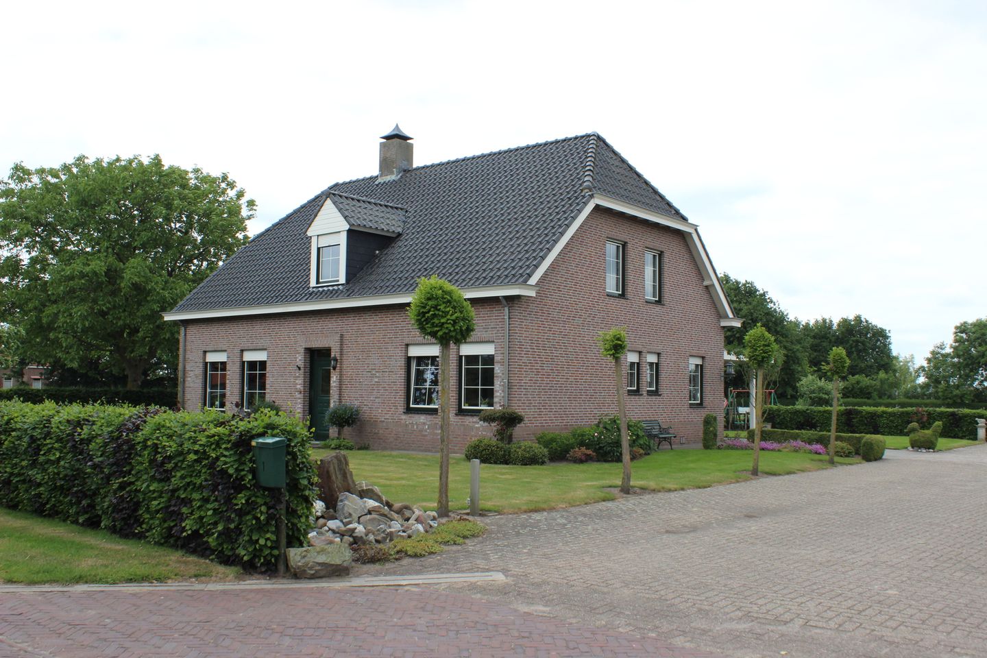 Bekijk foto 2 van de Blommers 1