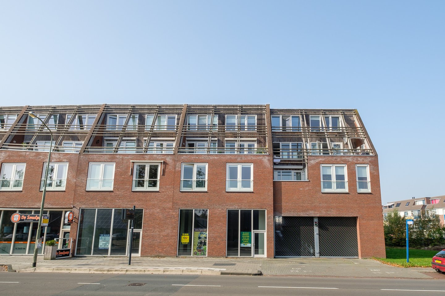 Bekijk foto 1 van Raadhuisstraat- Parkeerplaatsen
