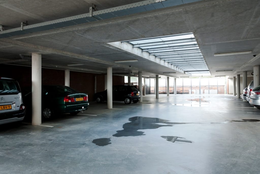 Foto 2 van Raadhuisstraat- Parkeerplaatsen