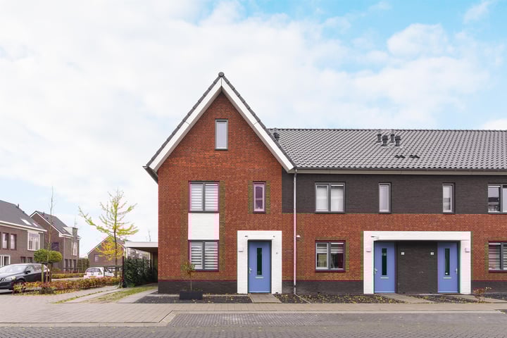 Muntheren - Hoekwoning met gedraaide kap