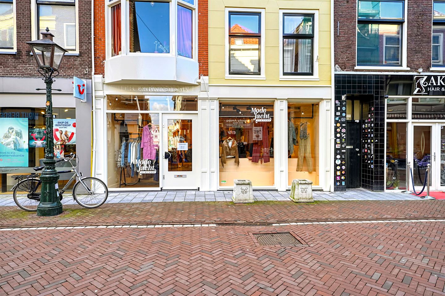 Bekijk foto 2 van Haarlemmerstraat 223-225