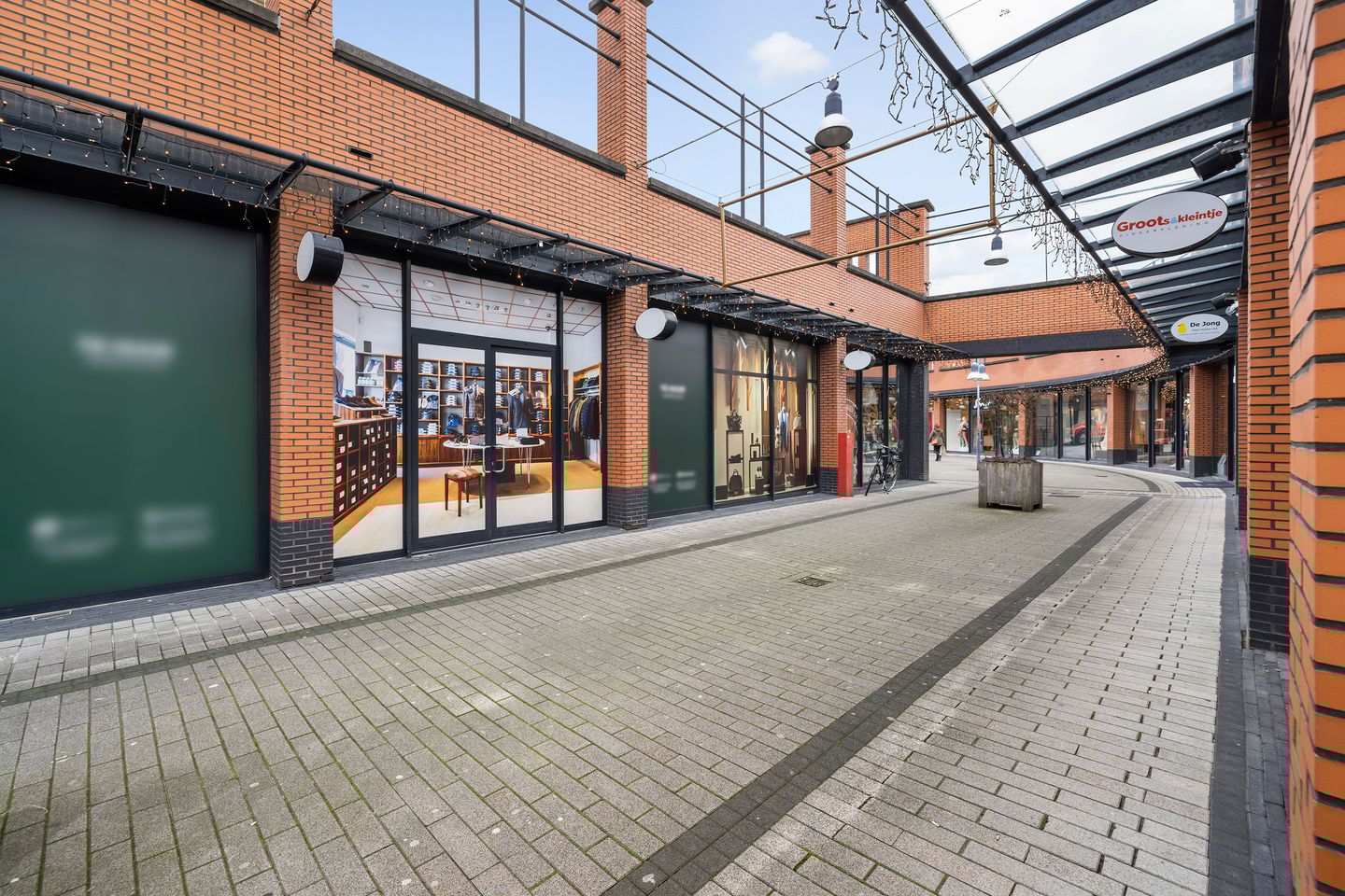 Bekijk foto 3 van Winkelcentrum De Schoof 21