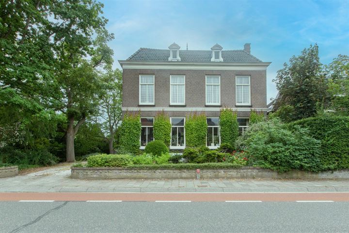 Bekijk foto 2 van Damstraat 102