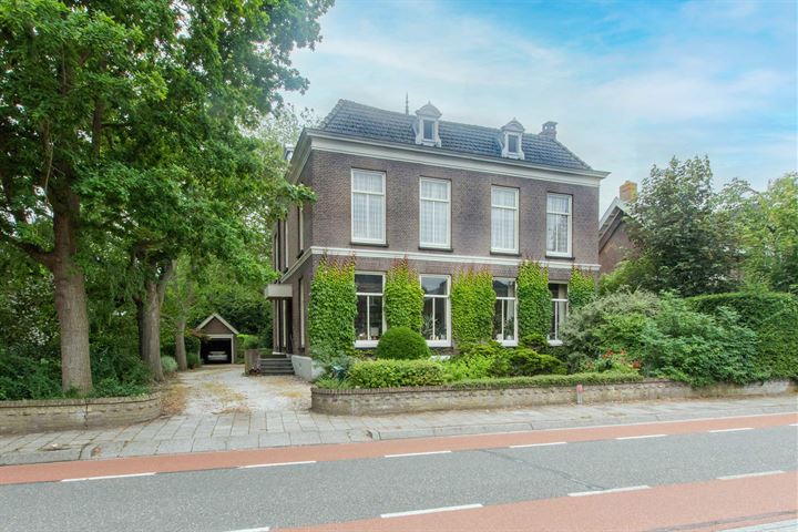 Bekijk foto 1 van Damstraat 102