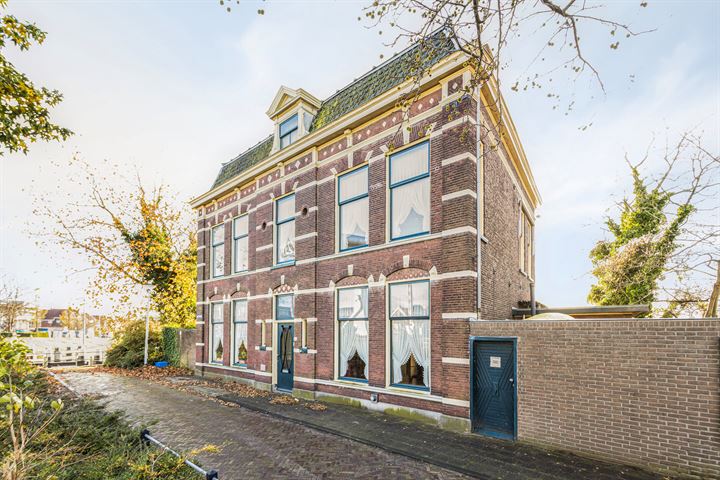 Bekijk foto 3 van Lage Rijndijk 142