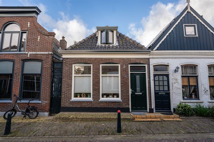 Bekijk foto 1 van Warmoesstraat 51