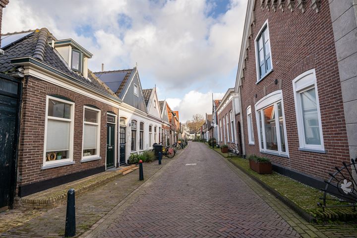 Bekijk foto 4 van Warmoesstraat 51