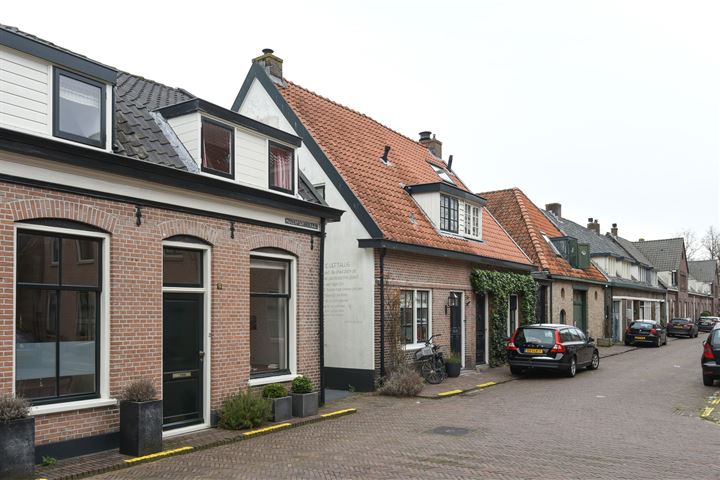 Bekijk foto 24 van Huizerpoortstraat 9