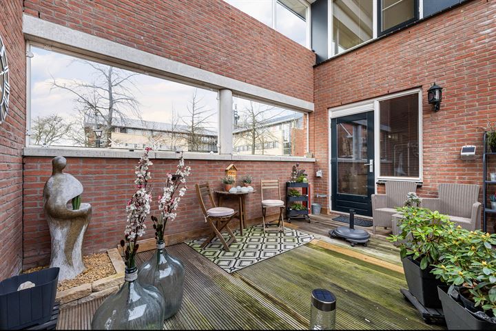 Bekijk foto 34 van Warmoezenierstraat 1