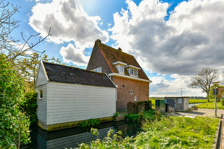 Bekijk foto 40 van Middenlaan Zunderdorp 18