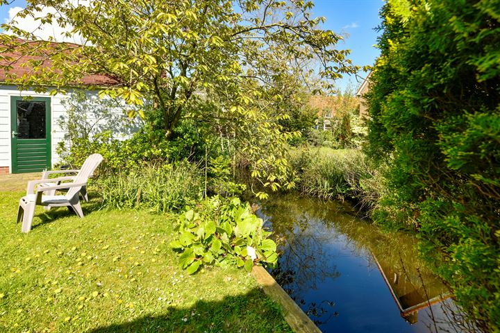 Bekijk foto 36 van Middenlaan Zunderdorp 18