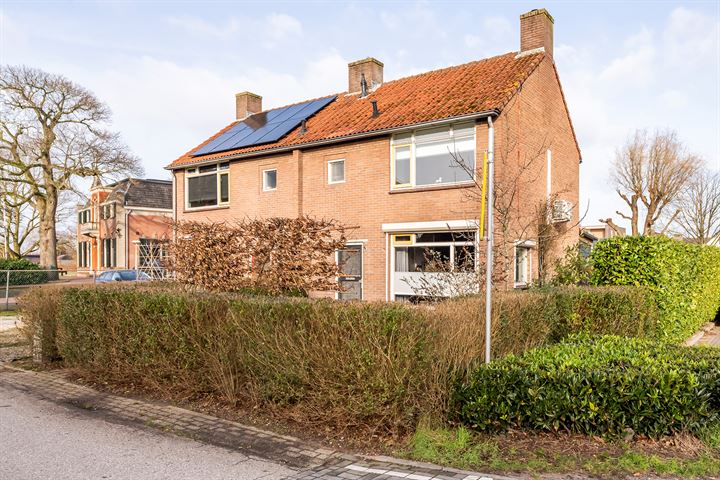 Bekijk foto 1 van Woudstraat 5