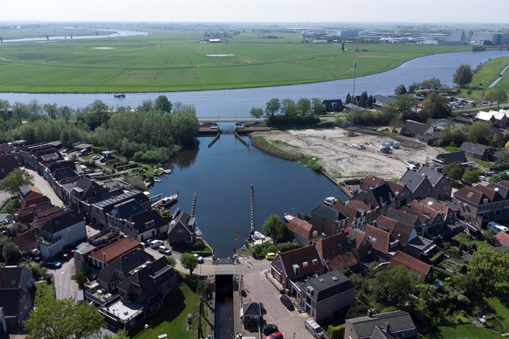 View photo 11 of Westeinde - De Whaa kavels aan vaarwater