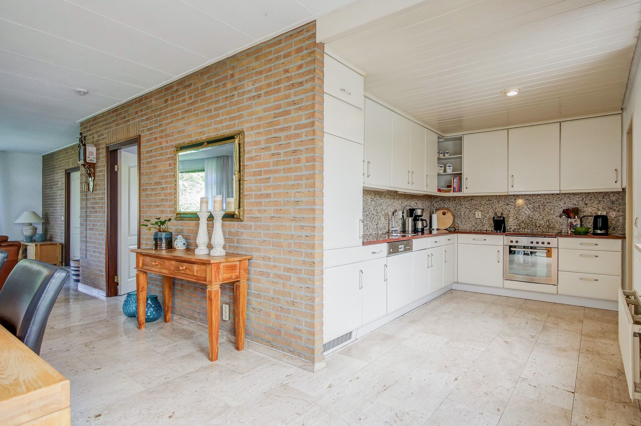 Foto 12 van Leeuwetand 27