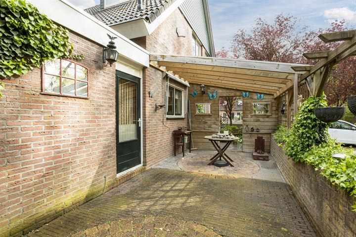 Bekijk foto 36 van Riegheidestraat 59