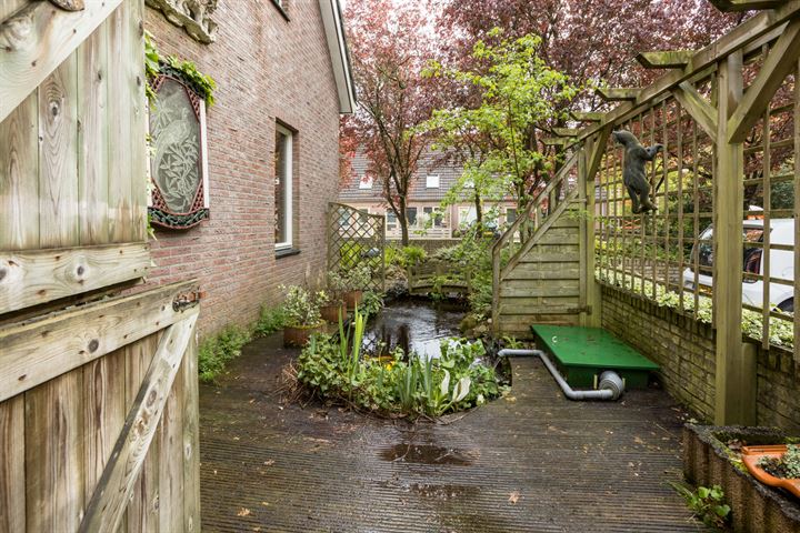 Bekijk foto 38 van Riegheidestraat 59