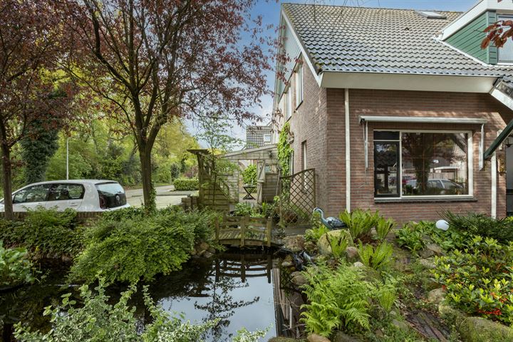 Bekijk foto 48 van Riegheidestraat 59