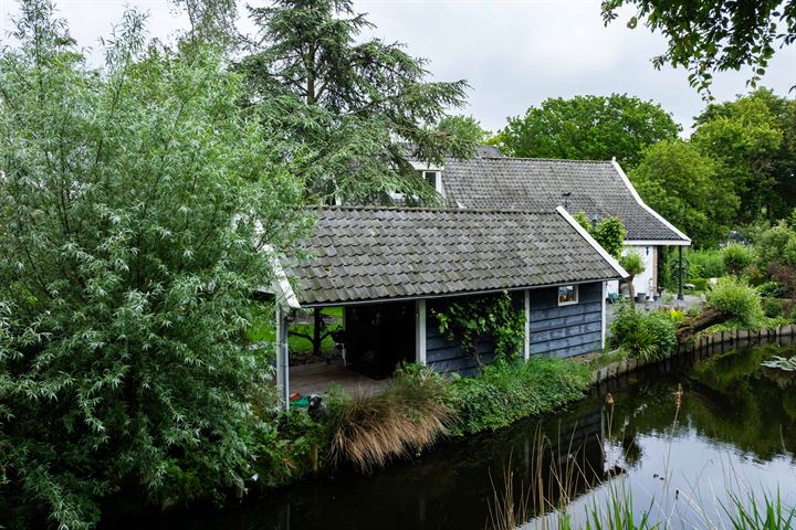 Bekijk foto 64 van Kanaalweg Westzijde 39