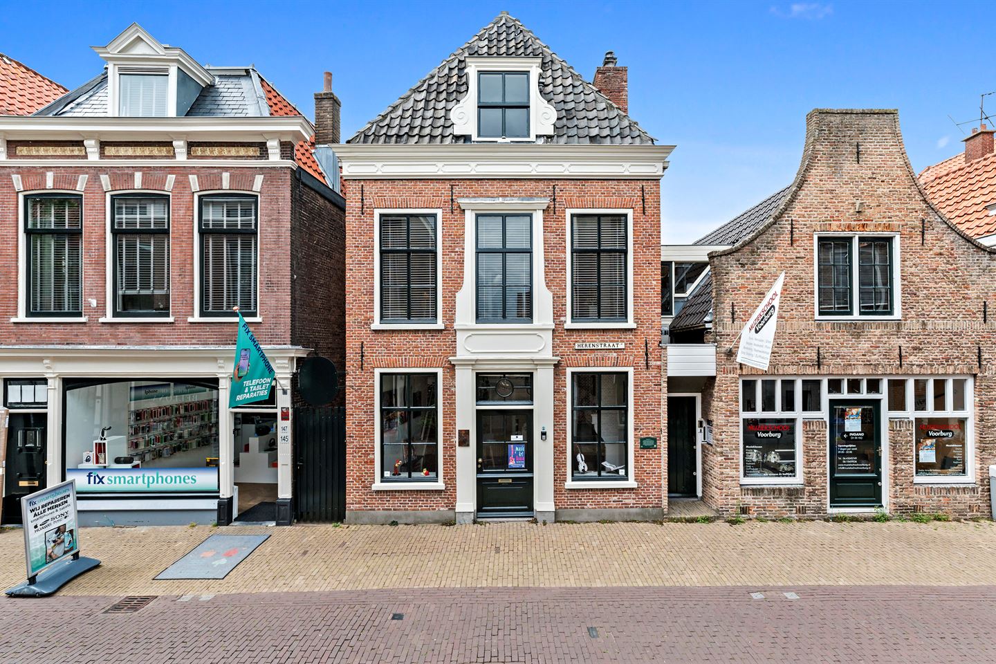 Bekijk foto 1 van Herenstraat 141-143