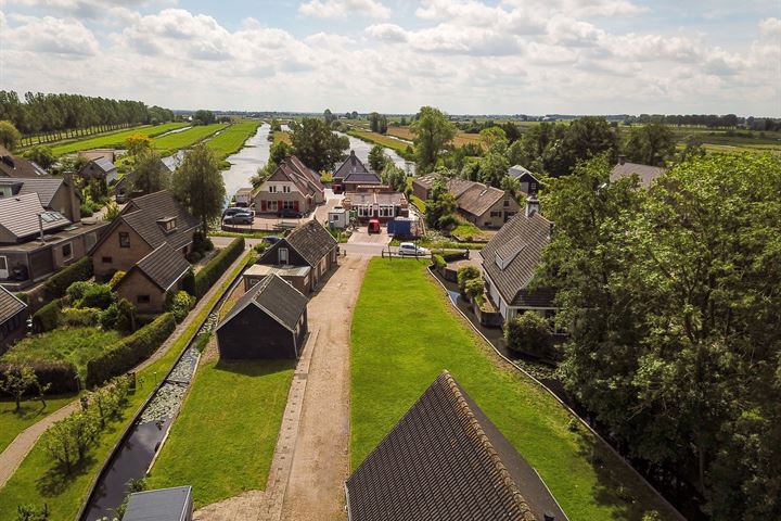 Bekijk foto 38 van Oudhuijzerweg 89