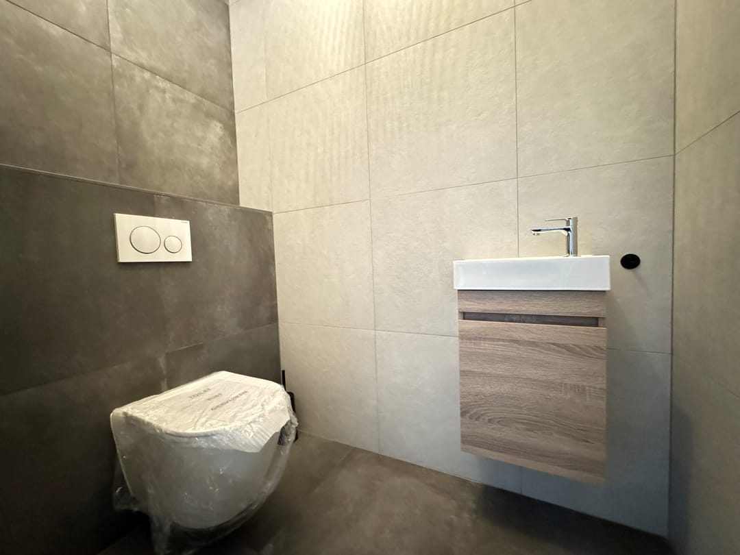 Foto 26 van Burg. Gremstraat 11