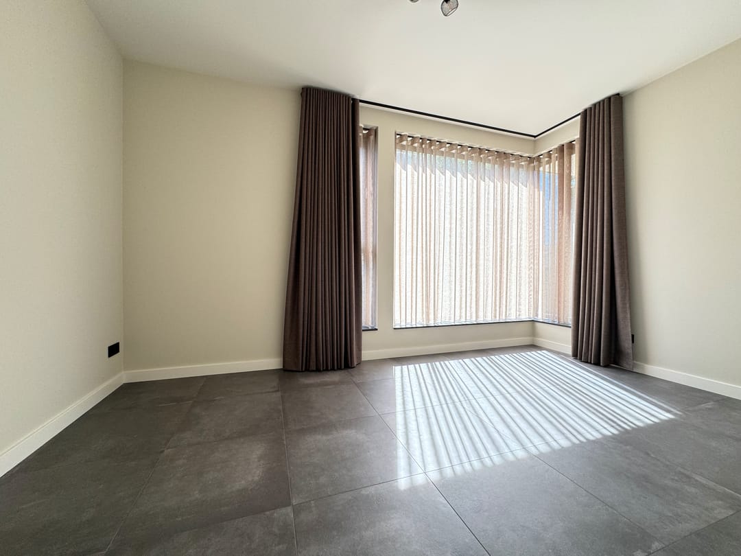 Foto 28 van Burg. Gremstraat 11