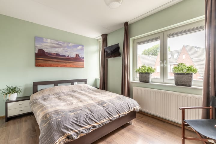 Foto 10 van Warmoeshof 6