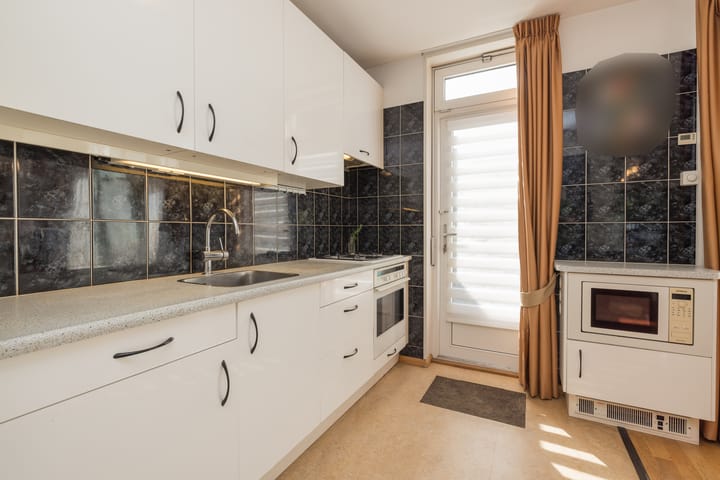 Foto 17 van van den Woudestraat 20