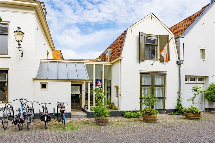 Bekijk foto 1 van Muurhuizen 36