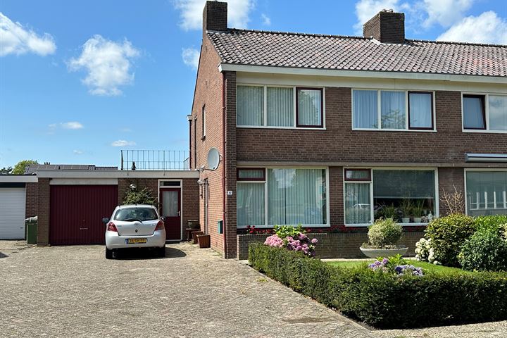 Bekijk foto 1 van Voeghoutenstraat 4