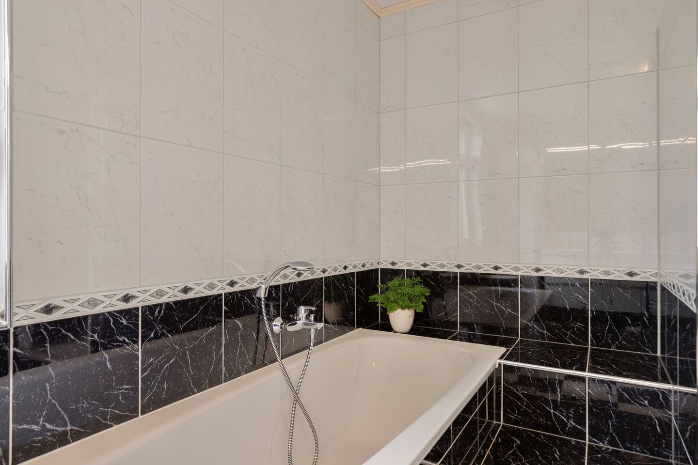 Foto 34 van Pastoor Ermenstraat 53