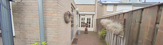 Bekijk 360° foto van Achtertuin van Clematisstraat 7