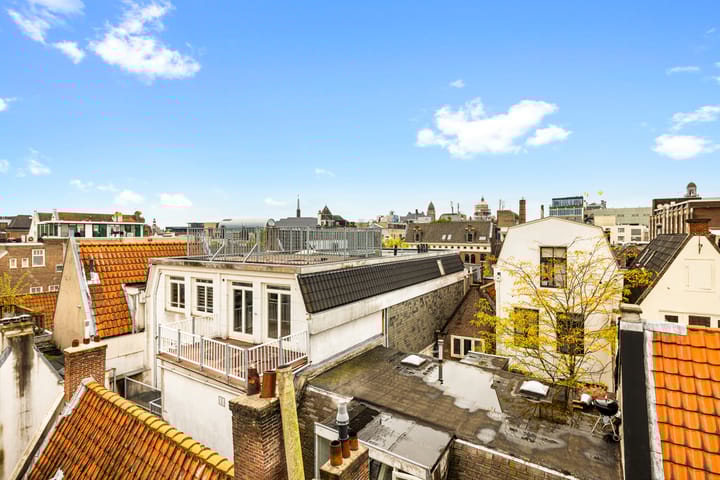 Foto 38 van Oudezijds Achterburgwal 128-C