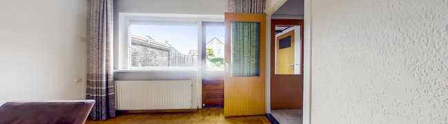 View 360° photo of Woonkamer of Brededwarsstraat 23