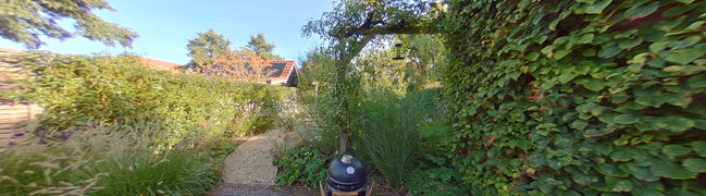 View 360° photo of Achtertuin of Robert Johnsonstraat 41