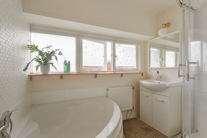 Foto 26 van Van de Sande Bakhuyzenstraat 20