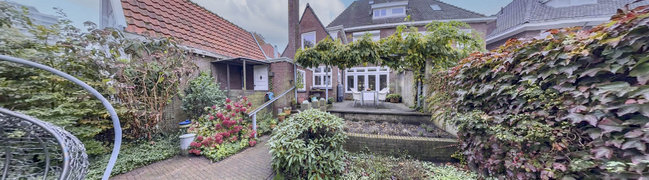 View 360° photo of Achtertuin of Taalstraat 52