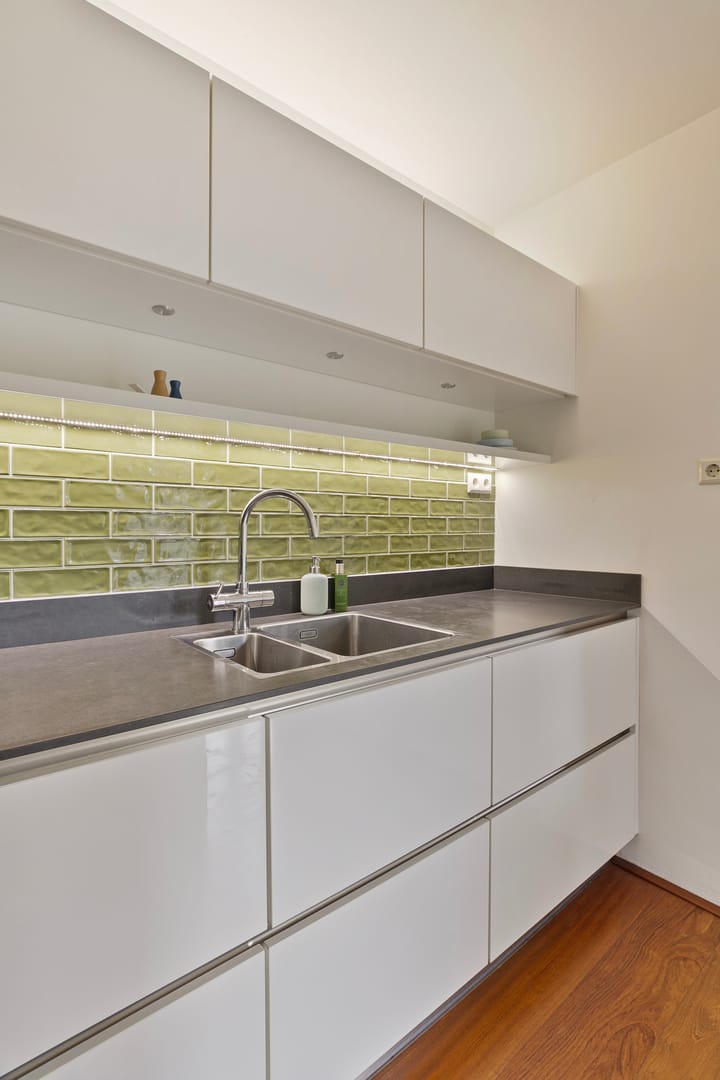 Foto 18 van Burg. J. Poschstraat 10