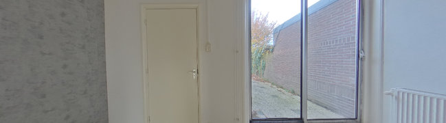 View 360° photo of Woonkamer of Zandstraat 82