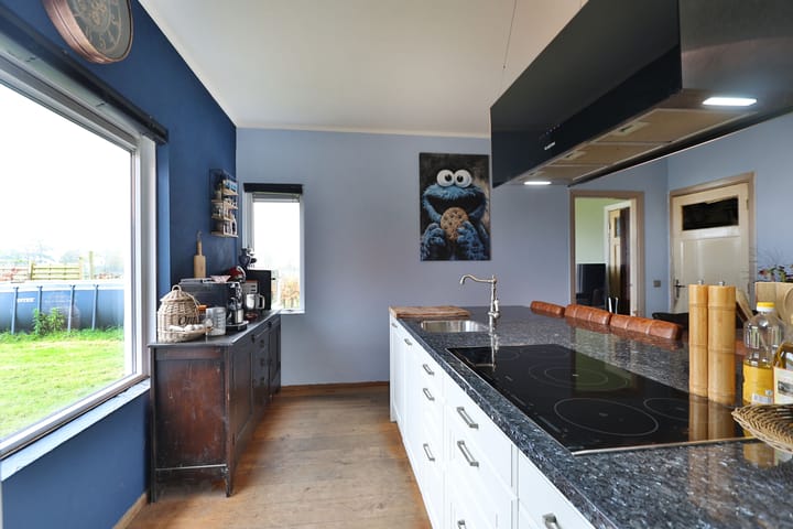 Foto 16 van Voskuilerdijk 8