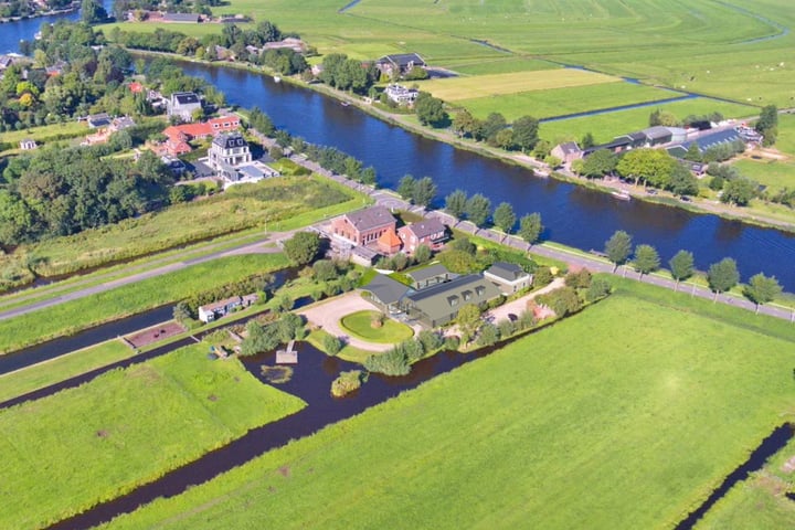 Bekijk foto 2 van Amsteldijk Noord 67