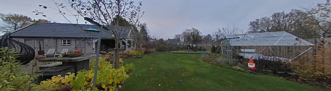 View 360° photo of Achtertuin of Wollegras 28