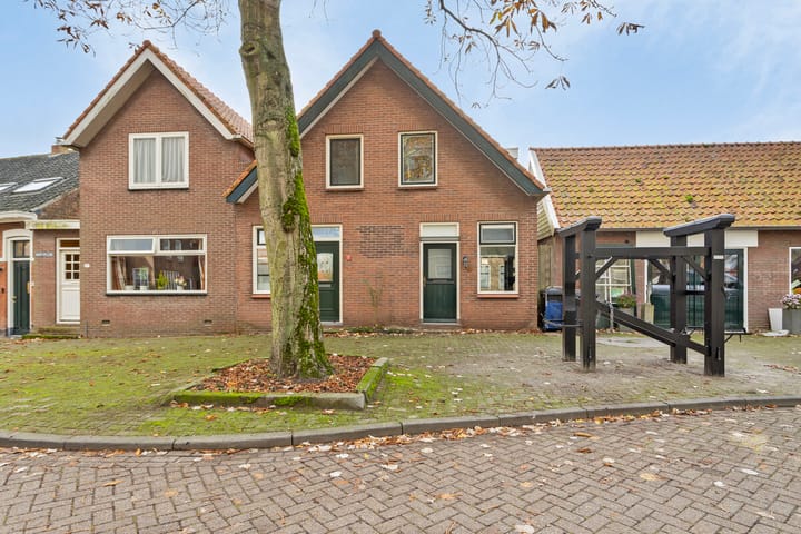 Foto 1 van Dorpsplein 7-B