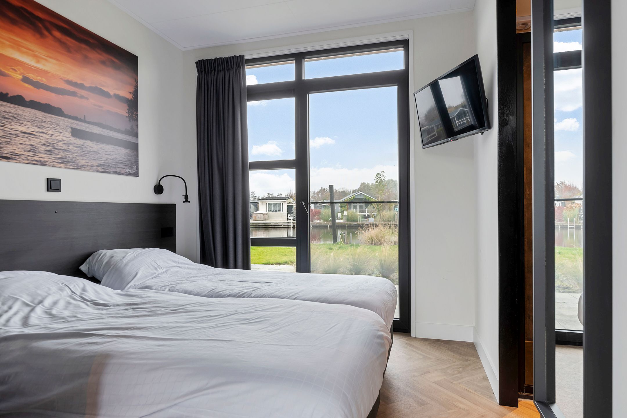 Foto 18 van Nieuw-Loosdrechtsedijk 215-CH020