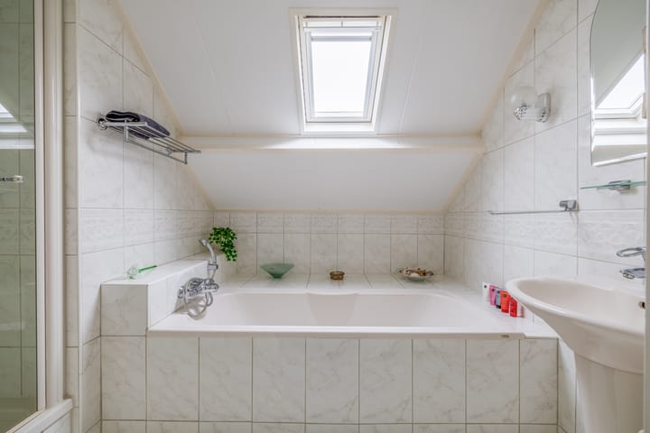 Foto 26 van Achthuizensedijk 82-B