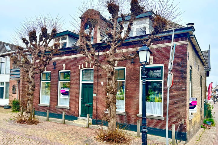 Bekijk foto 1 van Kerkplein 13