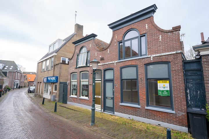 Bekijk foto 5 van Warmoesstraat 49