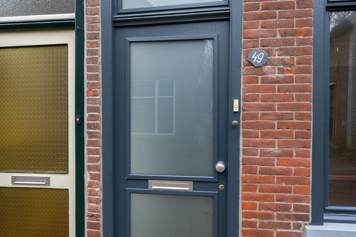 Bekijk foto 34 van Warmoesstraat 49