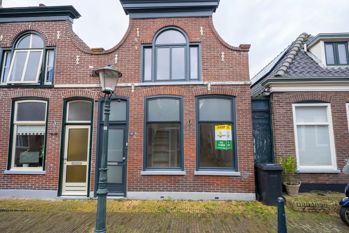 Bekijk foto 35 van Warmoesstraat 49