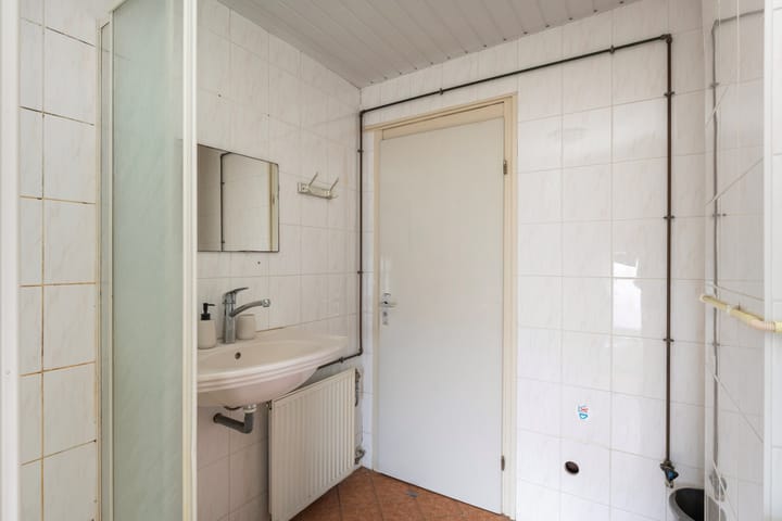 Foto 32 van Drie Octoberstraat 18-A